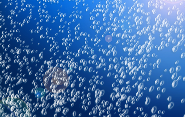 粒子をイメージした細かい泡の水中写真