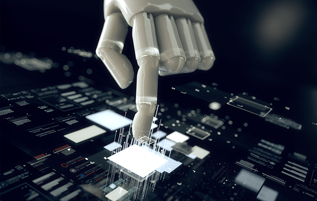 スイッチを押しているロボットの手の画像